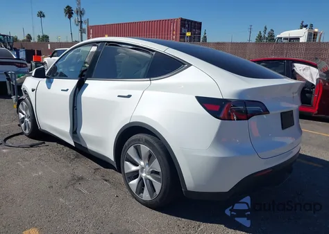 2023 Tesla Model Y z USA, uszkodzony, nr VIN 7SAYGAEEXPF591848